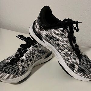 On Sale $19.           New Balance Black and White Sneakers